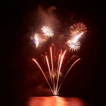 Colorful fireworks on the black sky background