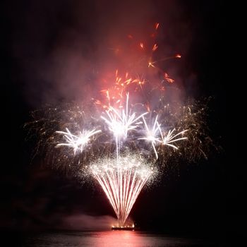 Colorful fireworks on the black sky background