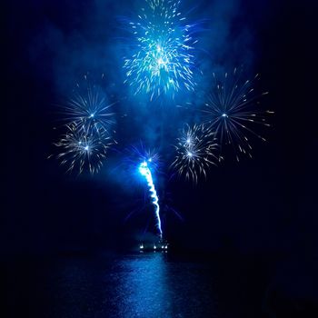 Colorful fireworks on the black sky background