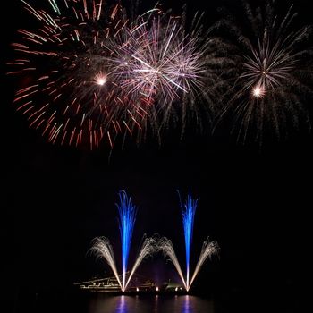 Colorful fireworks on the black sky background