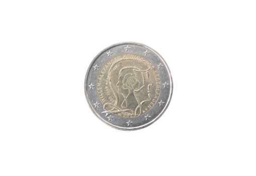 Commemorative 2 euro coin of the Netherlands  minted in 2013 isolated on white