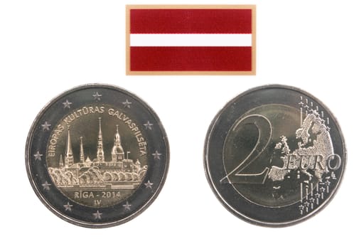 Two sides of commemorative coin of Latvia isolated on white