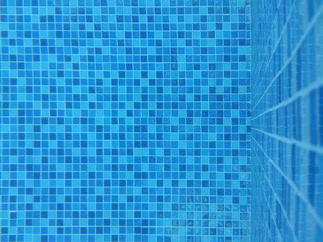 Mosaic tiles blue pattern of swimming pool