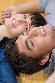 Romantic couple at home relaxing on the floor