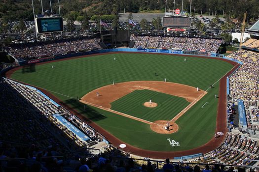 A sunny day baseball game at Dodger Stadium.