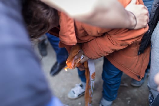 GREECE, Idomeni: A desperate woman tries to set herself on fire on March 1, 2016 in Idomeni to protest against Macedonia's decision to close its border. 