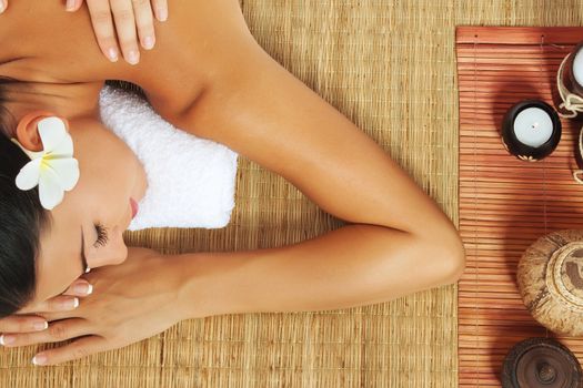 portrait of young beautiful woman in spa environment