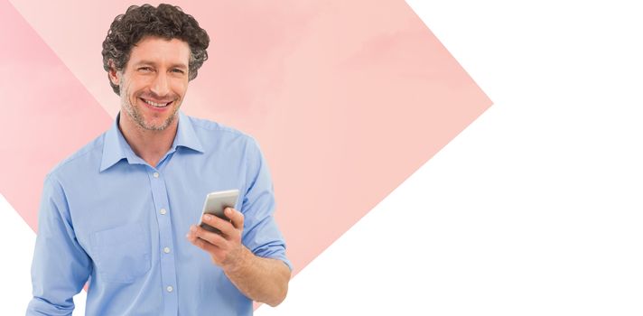 Businessman holding mobile phone over white background against landscape against white sky