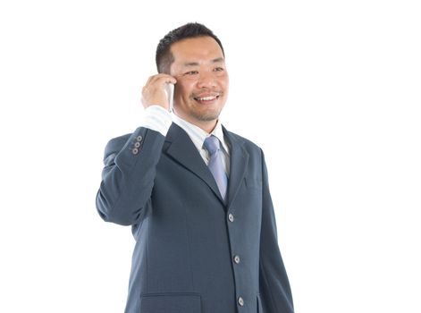 Southeast Asian business man on smartphone communication