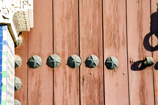 brown  morocco in africa the old wood  facade home and rusty safe padlock 