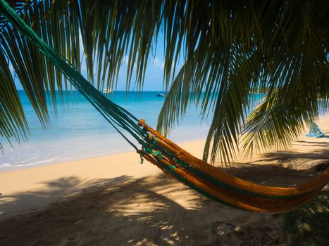 Amaca on a tropical beach by seaside