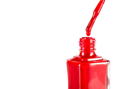 red nail polish closeup on white background