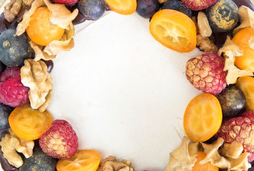 Fruits on birthday cake close up