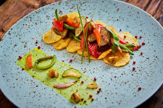 Potato Chips with sweet pepper, aubergine and asparagus. Healthy  food, vegan or diet nutrition concept.