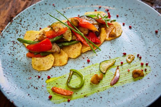 Potato Chips with sweet pepper, aubergine and asparagus. Healthy  food, vegan or diet nutrition concept.