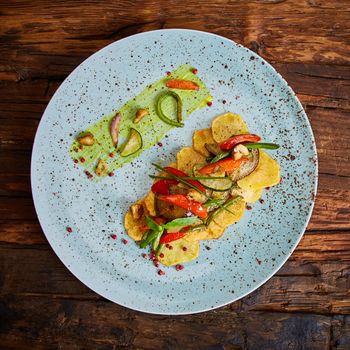 Potato Chips with sweet pepper, aubergine and asparagus. Healthy  food, vegan or diet nutrition concept.