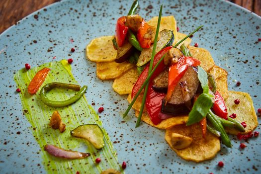 Potato Chips with sweet pepper, aubergine and asparagus. Healthy  food, vegan or diet nutrition concept.