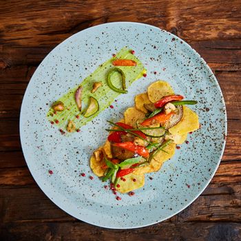 Potato Chips with sweet pepper, aubergine and asparagus. Healthy  food, vegan or diet nutrition concept.