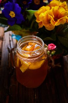 Ginger tea with orange, spices and honey. Shallow dof