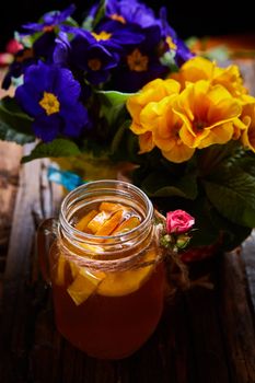 Ginger tea with orange, spices and honey. Shallow dof