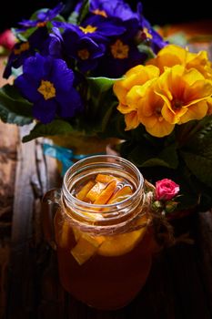 Ginger tea with orange, spices and honey. Shallow dof