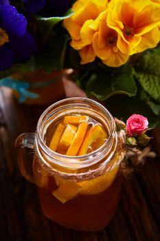 Ginger tea with orange, spices and honey. Shallow dof