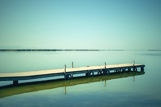 Calm water of the Albufera lagoon. Natural park in Valencian Community, Spain.