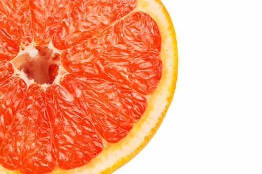 Slice a fresh juicy red round grapefruit
