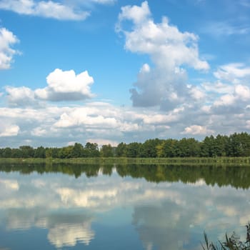 blue lake with cloudy sky, nature series