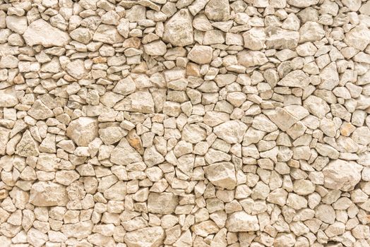 Stone walls caused by the specter of stone of various sizes.