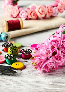 Pink hyacinth and tools for making jewelry for spring