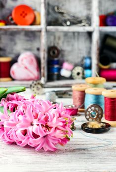 Pink hyacinth and tools for making jewelry for spring