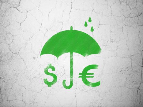 Privacy concept: Green Money And Umbrella on textured concrete wall background