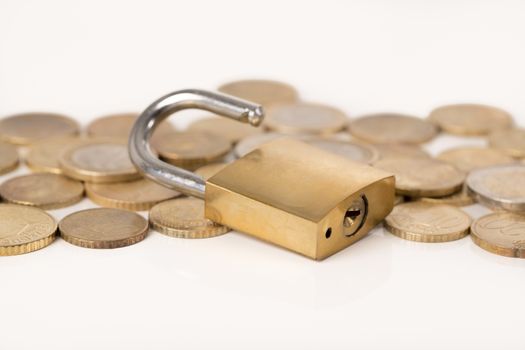 Credit card payment concept : Golden credit card with coins in white background.