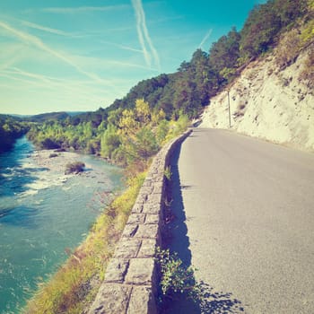 Asphalt Road along the River Bank in French Alps, Instagram Effect