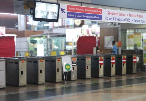 Rail station access gate