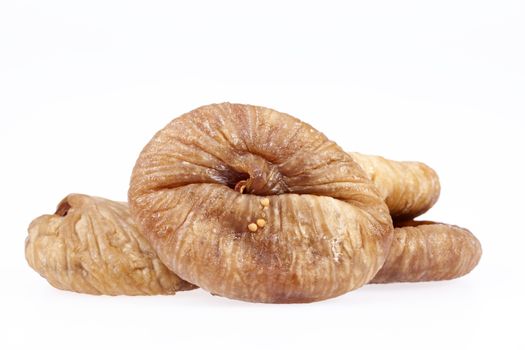 some fruits of dried fig isolated on white background.