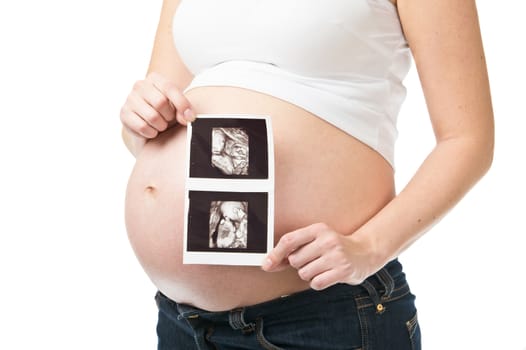 Pregnant woman showing ultrasonography 3D picture of her child isolated on white