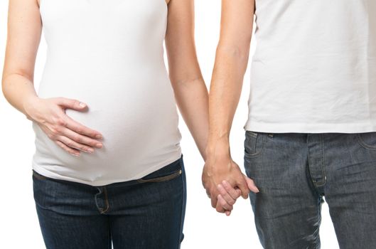 Pregnant woman and man holding hands isolated on white