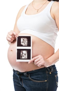 Pregnant young woman showing ultrasound picture isolated on white