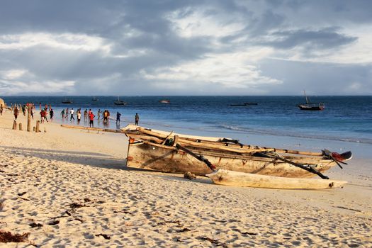 Zanzibar, Tanzania - January 4, 2016: A game of football on the beach at sunset in Nungwi. Zanzibar, Tanzania
