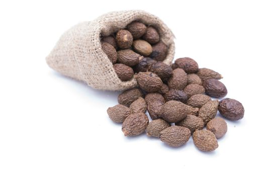 Sterculia lychnophora,Malva nut tree or Taiwan sweet gum tree in gunny bag on white background