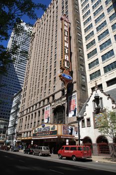 Famous marquee of Oriental Theater on a busy street in Chicago, Illinois.