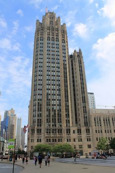 Chicago Tribune Tower on Michigan Avenue. Street scene with pedestrians.