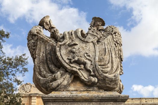 Stone bas-relief with lion before City Gate to the medieval town Mdina, Malta , Europe