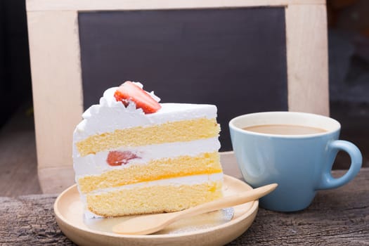 Coffe and Cake on wooden background