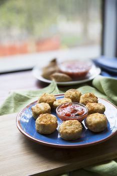 Crispy breaded fried tapas with a tomato dipping sauce.