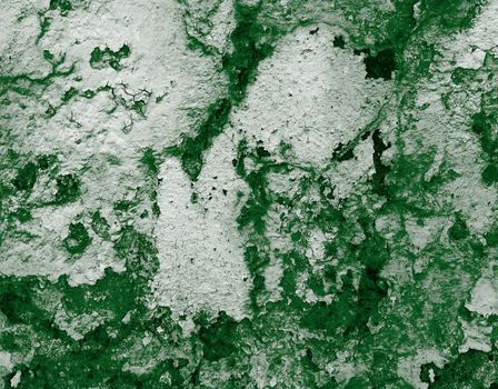 Dark Green and White Damaged Obsolete Cracked Cement Wall Background closeup