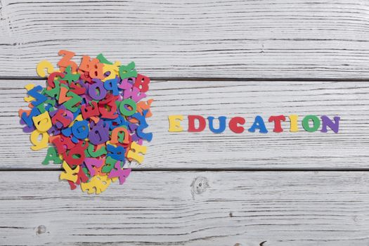 colorful words on white wooden background