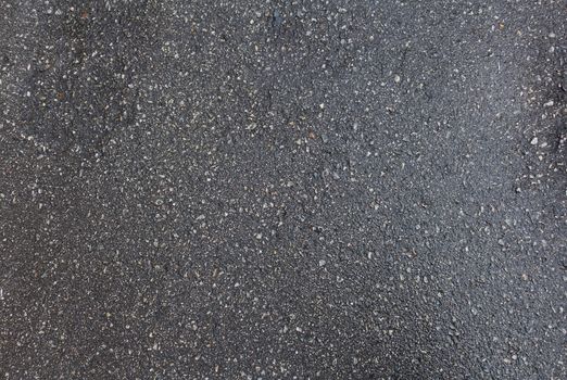 Wet black dirty asphalt road texture background